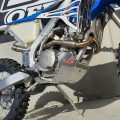 B&B aluminium bash plate fitted to a blue Sherco dirt bike