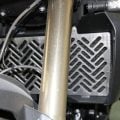 Silver slotted radiator guard installed on BMW F800GS