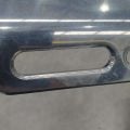 Chamfer Edge Component – Precision-machined metal part with a chamfered edge, possibly for reinforcement or structural support in motorcycle accessories.