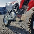 B&B aluminium bash plate fitted to a Honda CRF125F dirt bike