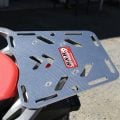 Polished B&B mini rear luggage rack fitted to a Honda motorcycle