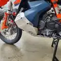 KTM 890 Adventure bash plate installed beneath the engine